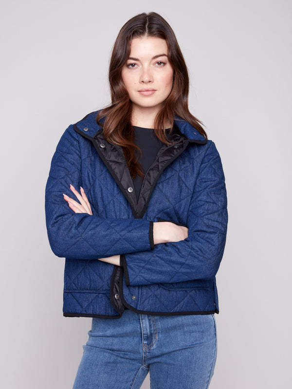 Puffer jacket in classic blue denim, highlighted by its snap button front closure for ease by Charlie B.