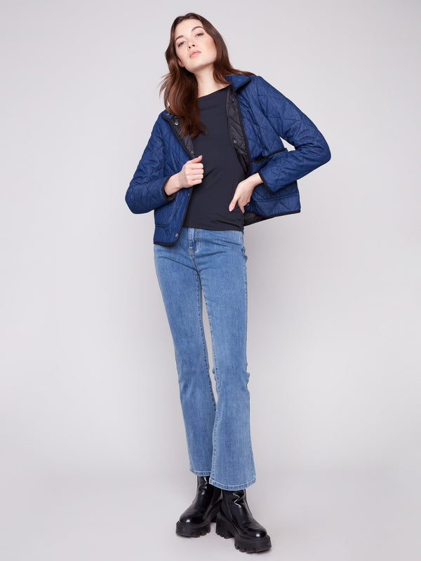 Chic blue quilted puffer jacket made from 100% cotton, featuring practical patch pockets by Charlie B.