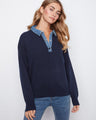 Navy sweater featuring a classic denim shirt collar, perfect for a casual yet polished look. Crafted with attention to detail by Charlie B.