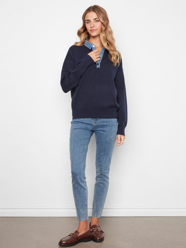 Discover the elegance of long sleeves paired with a denim collar in this versatile navy sweater. A chic addition to any outfit by Charlie B.