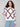 White sweater with cabernet diamond pattern and a cozy crew neck, highlighting the drop shoulder design by Charlie B.