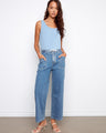 Denim pants featuring a wide leg fit with patch pockets for added style and functionality. By Charlie B.
