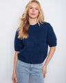 Soft brushed knit sweater with floral button details at cuffs, featuring elbow-length sleeves for a cozy look by Charlie B.