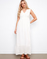Natural sleeveless dress featuring an elegant V-neckline and flowing maxi length by Charlie B.