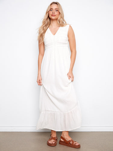 White maxi dress with intricate embroidered detail, adding a touch of elegance by Charlie B.