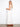 Sleeveless white dress with a flattering empire seam for a graceful silhouette by Charlie B.