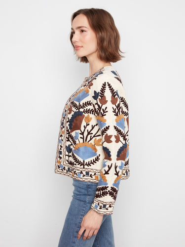 Vibrant basketweave textured jacket with intricate floral designs in rich autumnal hues by Charlie B.
