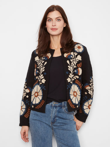 This jacket features a collarless style with intricate embroidery, offering a chic and modern look by Charlie B.