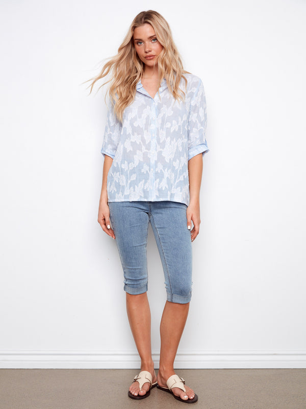 Embrace the elegance of all-over embroidery on this 100% cotton shirt, adding texture and charm to your wardrobe by Charlie B.