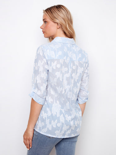 The roll-up 3/4 sleeves add versatility to this embroidered shirt, making it ideal for any occasion in soft cotton by Charlie B.