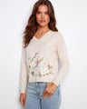 Beige V-neck sweater made from 100% cotton, adorned with floral embroidery, perfect for a casual yet stylish look by Charlie B.