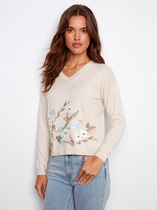 Beige V-neck sweater made from 100% cotton, adorned with floral embroidery, perfect for a casual yet stylish look by Charlie B.