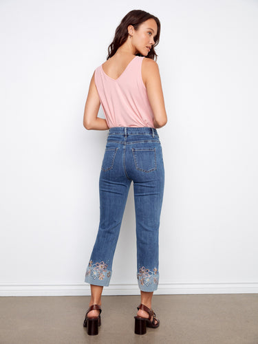 Stylish five-pocket design on medium blue cropped jeans with embroidered detail at the hem by Charlie B.