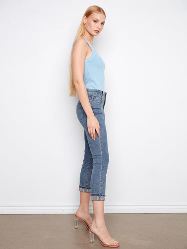 These regular rise jeans in medium blue offer a stylish cropped length with detailed embroidery at the hem by Charlie B.