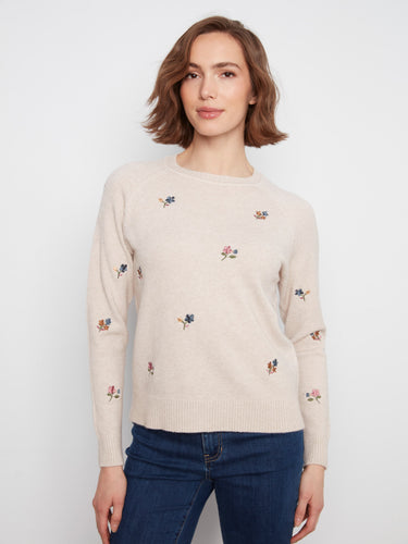 This sweater features a classic crew neck, adding a timeless touch to your wardrobe. Perfect for layering or wearing alone by Charlie B.