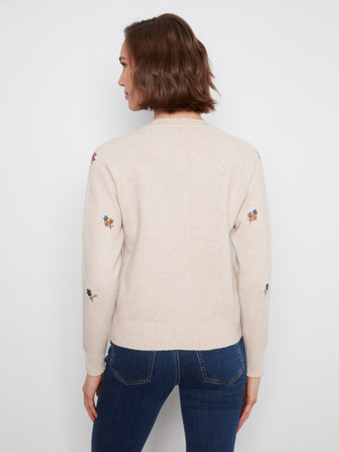 The soft knit fabric of this sweater ensures warmth and coziness during cooler days, making it an ideal choice by Charlie B.