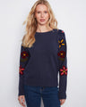 This sweater features a classic crew neck design, perfect for a casual yet stylish look. Crafted with care by Charlie B.