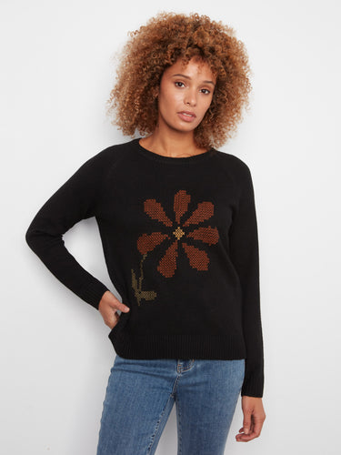 Chic black sweater highlighted with an intricate embroidered floral pattern, ideal for any occasion by Charlie B.