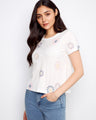 This top features a classic crew neckline, adding a touch of elegance to its casual design. Made from 100% cotton by Charlie B.