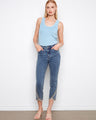 Denim jeans featuring a slim fit with a frayed embroidered tulip hem, adding a touch of elegance. By Charlie B.