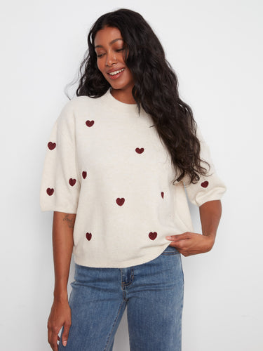 Soft brushed knit sweater with charming embroidered hearts, perfect for a cozy day. By Charlie B.