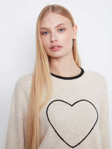 Long sleeves enhance the cozy feel of this heart-embroidered sweater, perfect for cooler days. A stylish choice by Charlie B.