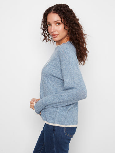 Elegant heather natural sweater adorned with heart embroidery, highlighting its drop shoulder design by Charlie B.