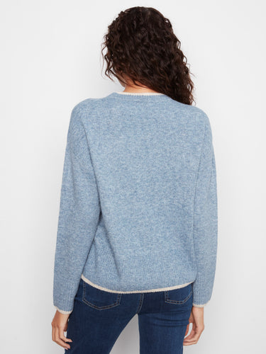 Chic blue sweater with detailed heart embroidery, complete with ribbed cuffs and hem for a cozy feel by Charlie B.