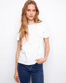 White T-shirt featuring a classic crew neckline and delicate embroidered hearts for a charming touch by Charlie B.