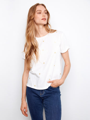 Crafted from 100% cotton, this white T-shirt ensures comfort and breathability all day long by Charlie B.