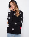 Black hoodie with embroidered hearts, featuring long sleeves and a cozy hood for added warmth. Perfect for casual outings by Charlie B.
