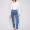 Medium blue jeans featuring a regular rise and stretch denim material, ideal for comfort and style by Charlie B.