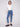 Ankle-length design enhances the sleek look of these medium blue embroidered hem jeans by Charlie B.