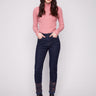 Deep blue jeans with a slim leg cut, featuring ankle-length design and intricate embroidery on the hem by Charlie B.