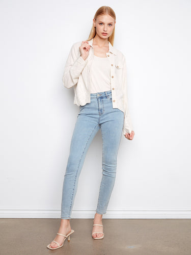 Stylish cream jacket adorned with embroidered hem and cuffs, adding elegance to any outfit by Charlie B.