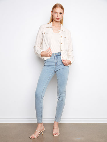 Cream-colored jacket with unique embroidered hem and cuffs, enhancing its stylish appeal by Charlie B.