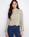 This jacket features a short length, perfect for pairing with high-waisted jeans or skirts. The design is both chic and versatile by Charlie B.