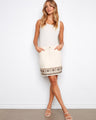 Natural skort featuring an embroidered hem and stretch twill fabric, perfect for a comfortable and stylish look by Charlie B.