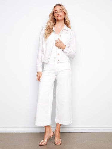 This stylish white jacket includes front pockets and a chic frayed hem, adding a touch of elegance to your wardrobe by Charlie B.
