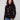 Sweater featuring a mock neck with beautiful floral embroidery, perfect for adding elegance to any outfit by Charlie B.