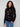 Sweater featuring a mock neck with beautiful floral embroidery, perfect for adding elegance to any outfit by Charlie B.