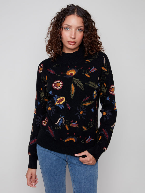 Sweater featuring a mock neck with beautiful floral embroidery, perfect for adding elegance to any outfit by Charlie B.