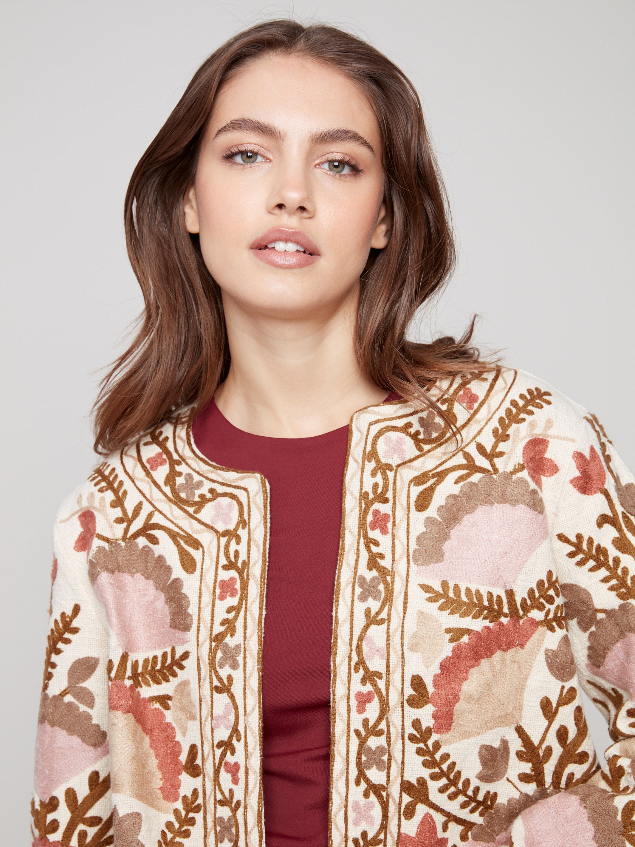 Stylish set-in long sleeves enhance the sophisticated design of this embroidered jacket by Charlie B.