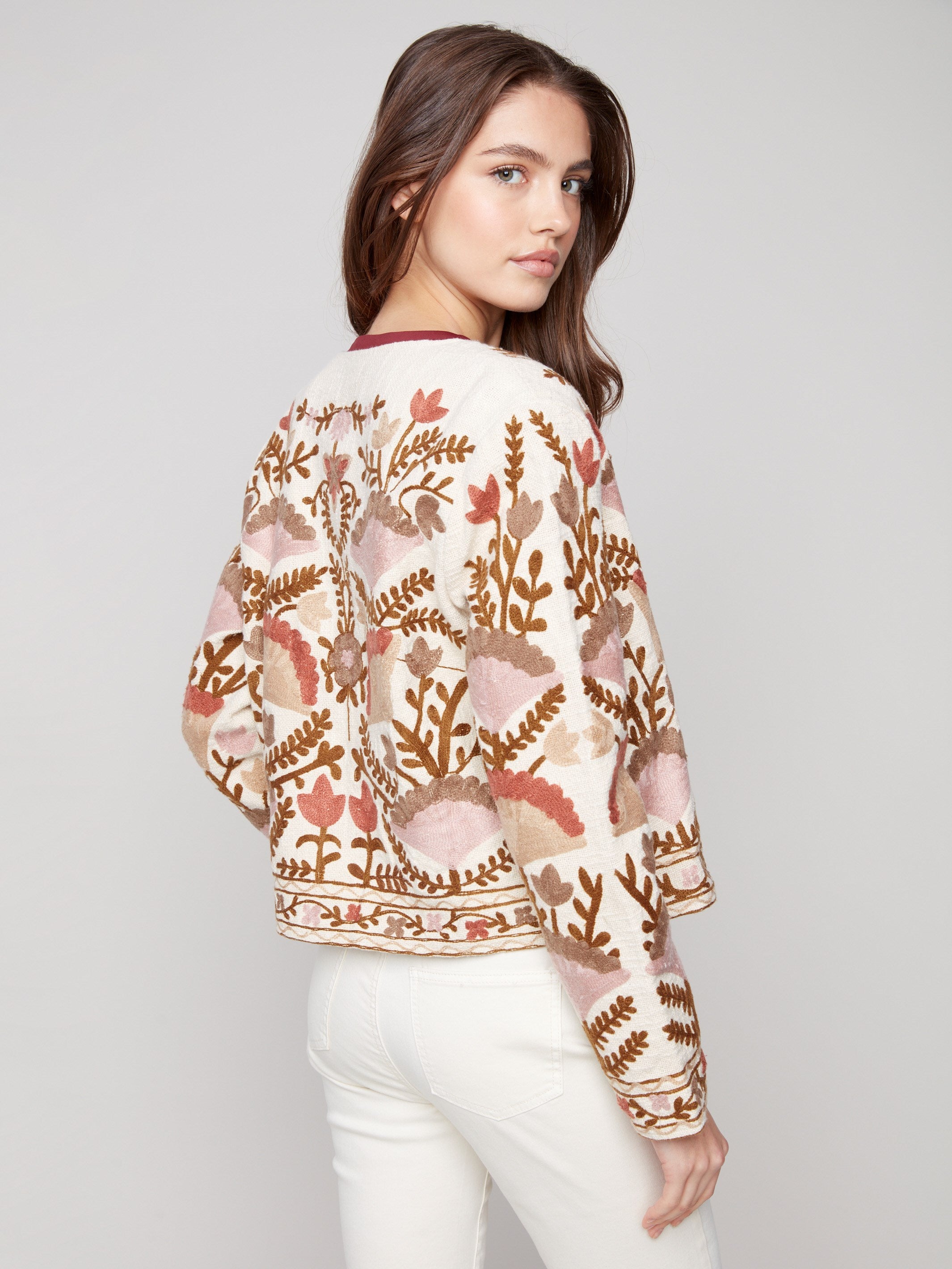 Beautifully crafted from 100% cotton, this embroidered jacket showcases timeless elegance by Charlie B.