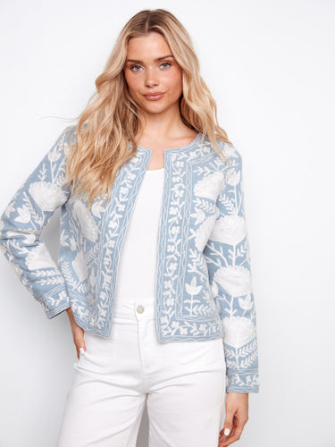 Elegant open-front light blue jacket featuring intricate embroidery on 100% cotton by Charlie B.