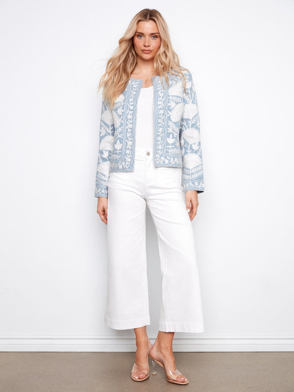 Chic light blue embroidered jacket with a floral motif, highlighting its open front style by Charlie B.