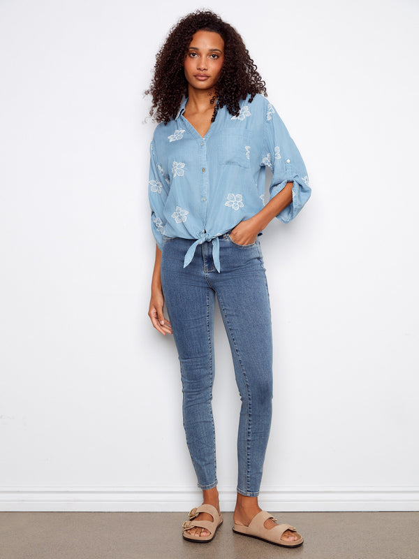 Floral embroidered blouse with button-down front, complemented by 3/4 roll-up sleeves by Charlie B.