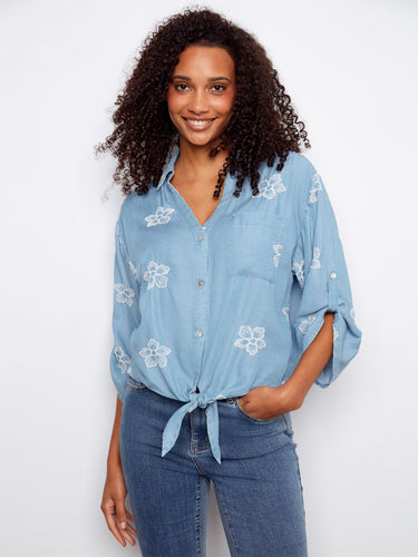 Embroidered blouse featuring 3/4 rolled-up sleeves and a stylish collared V-neckline by Charlie B.