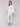 Sophisticated white blouse highlighting unique design elements by Charlie B.