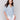 Blue cotton blouse with V-neck and eyelet details by Charlie B.